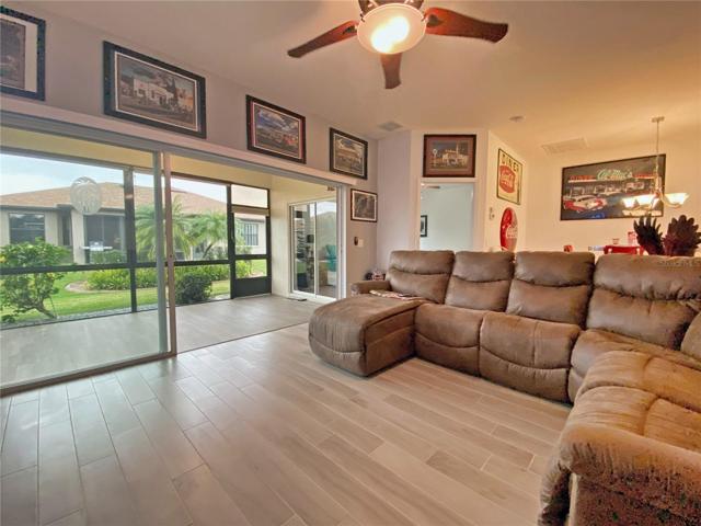 Tile Plank Flooring. Open the Sliders to the screened lanai