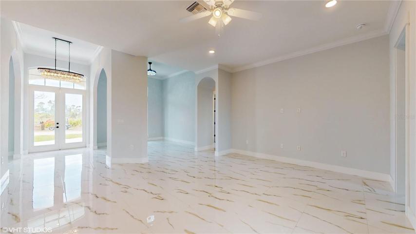 Family Room w/Main Entrance/Living Room View
