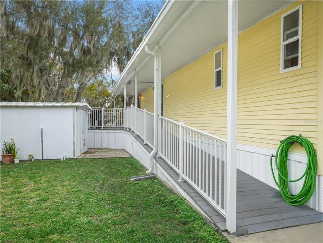 Covered walkway - stay dry and cool from the carport to the front door!