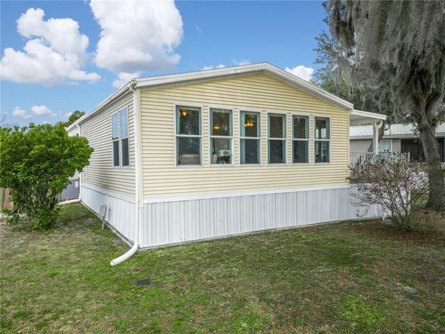 The back of the home has lots of windows so you have a great view of the lake from the open concept main living area.