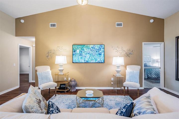 Living area with vaulted ceiling