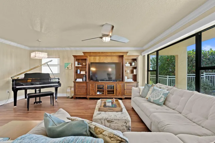 Living room offers plenty of space for entertaining, relaxing, and simply enjoying your views at all times of the day or night.