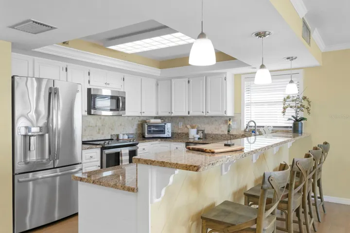 Two closet pantries or closets (not shown) are on the left of the refrigerator.