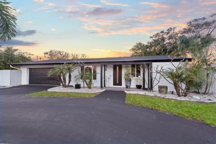 Front Elevation showing the modern design and covered front porch.