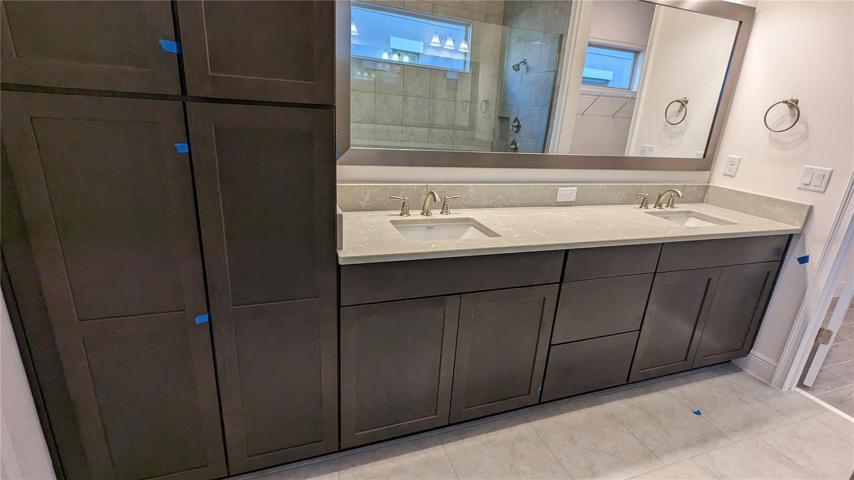 downstair master bathroom with walk in shower and double rainshowers