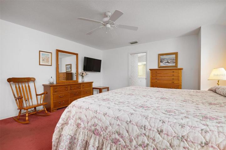 The primary bedroom will accommodate furniture of any size.