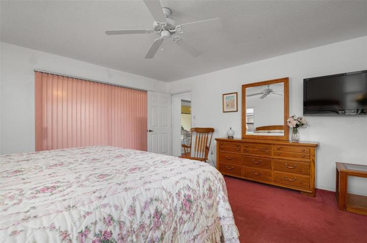 The enclosed lanai is offered off the primary bedroom.