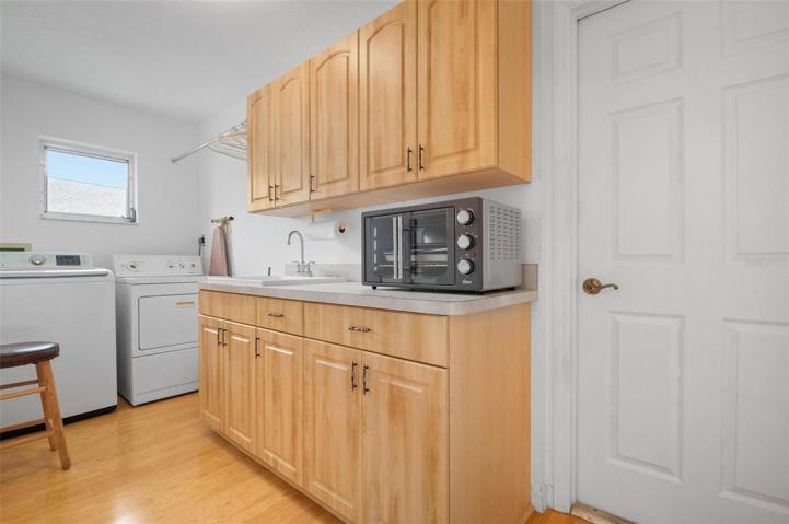 The combined laundry room and butler's panty.