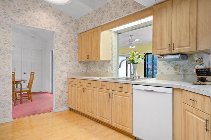 The formal dining room is located off the kitchen.