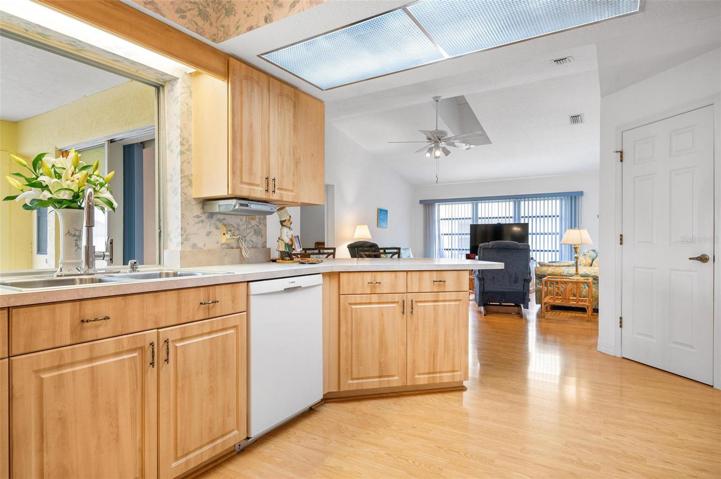 The family room is located off the kitchen.