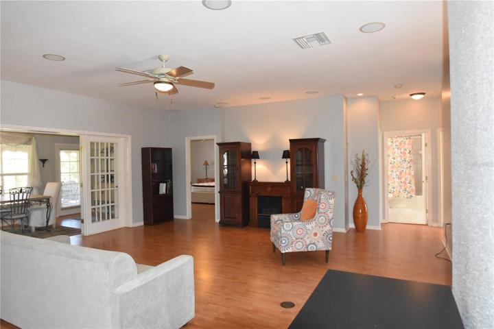 Living room with door to Master Bedroom and guest bathroom