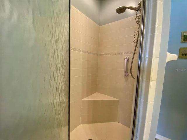 Master Bathroom large shower with corner seat