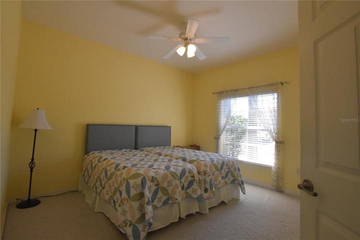 Guest bedroom with oversized window