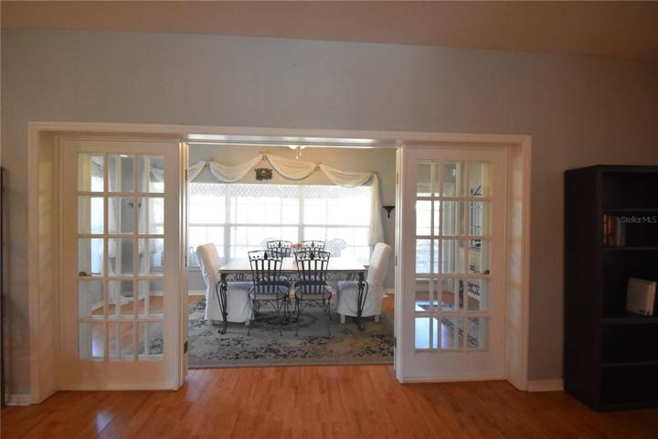 Lovely Dining room with french doors and large windows