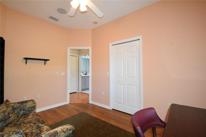3rd bedroom/den with closet and pocket door