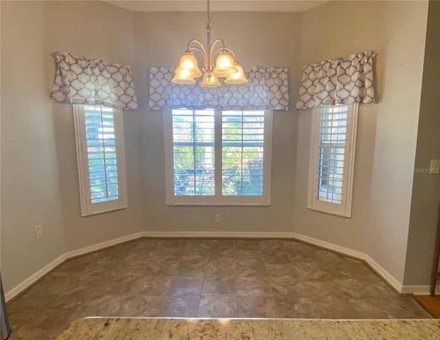 Kitchen nook with bay windows