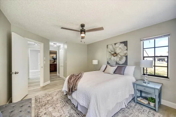 Master bedroom features a walk in closet & en suite. Extra window on end villa~