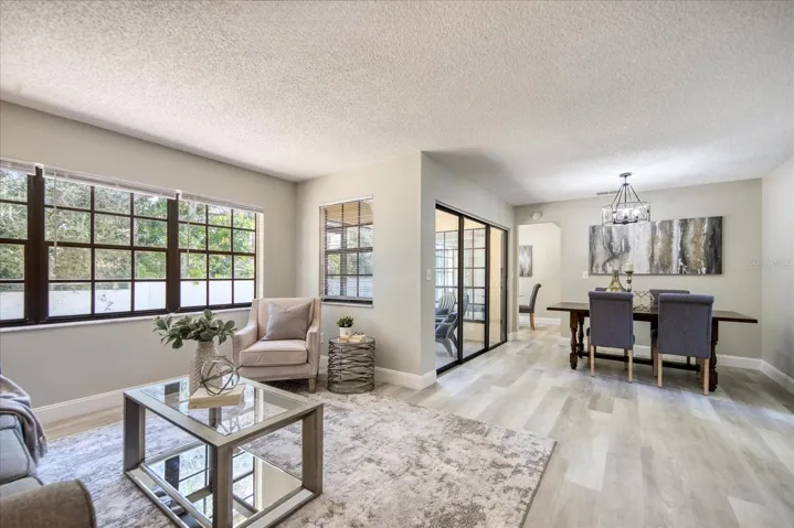 Open living and dining room areas~