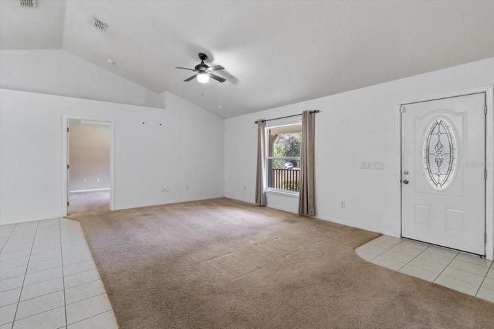 Great room at front entrance with view toward Master Suite