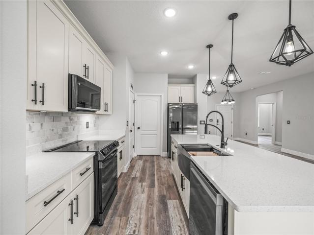 Soft-close cabinets and oversized kitchen island