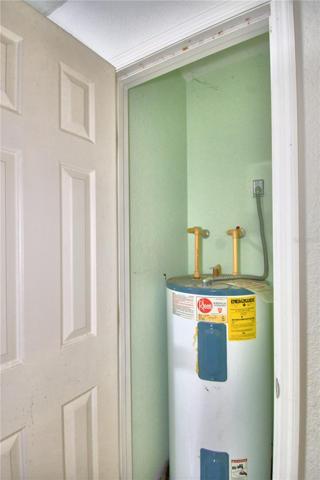 HOT WATER HEATER CLOSET IN GARAGE