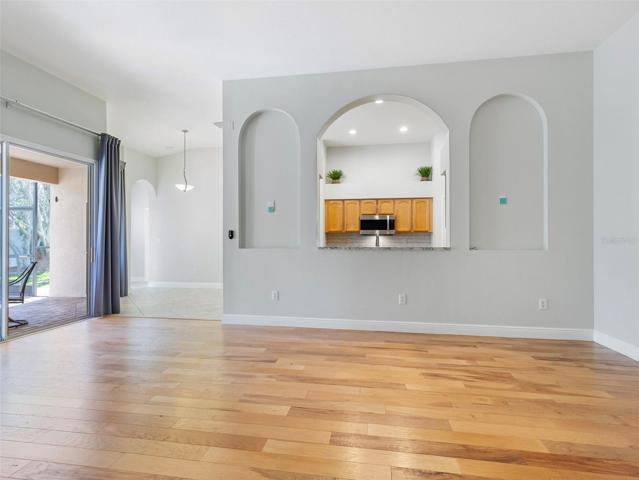 Family Room with view of passthrough window into kitchen