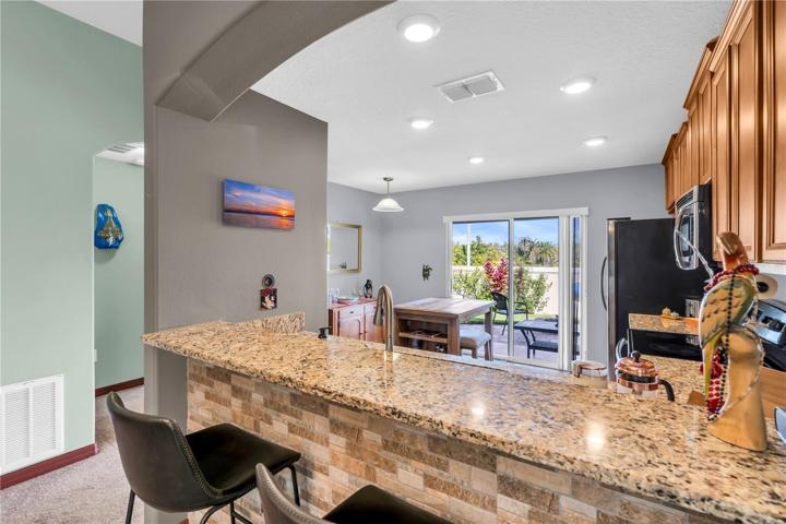 bar/counter leading to kitchen