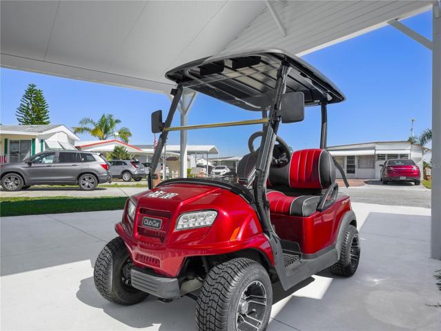 This Club Car golf cart is included in the list price of the home!!