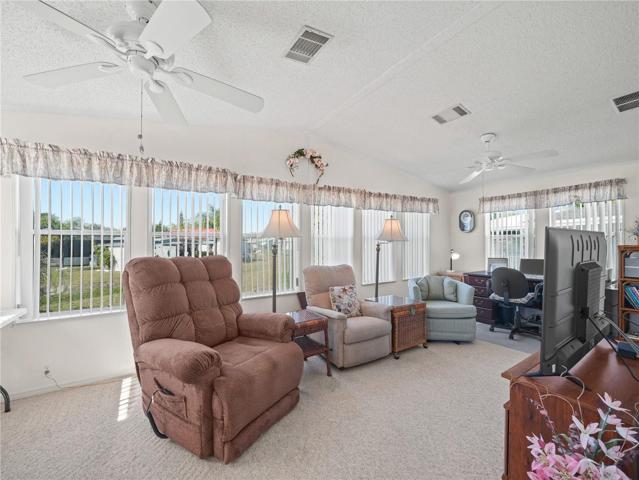 The full-width family room is perfect for large gatherings.