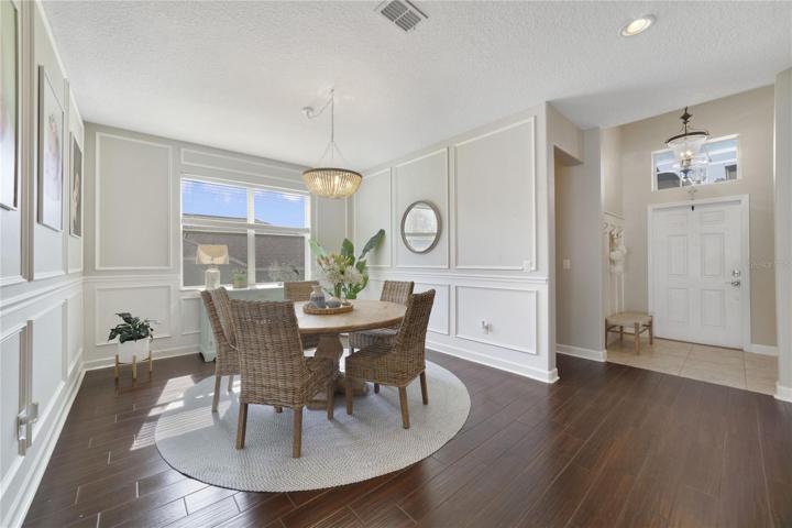 This home will give you all the feels from the moment you walk through the front door and start your tour in the chic dining room finished in beautiful detail with a large window to let the natural light pour in.