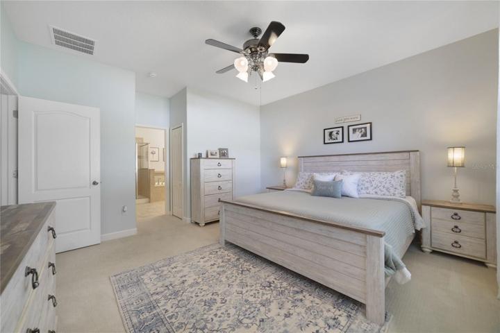 Split bedrooms deliver a generous PRIMARY SUITE where the modern neutral color palette continues and you have DUAL WALK-IN CLOSETS and a well appointed EN-SUITE BATH boasting an extended dual sink vanity, SOAKING TUB and separate glass enclosed shower!