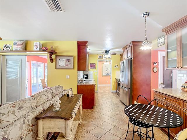 Family Room with extended kitchen cabinetry.