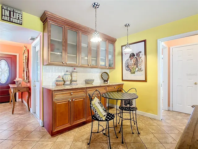 Family Room with extended kitchen cabinetry.