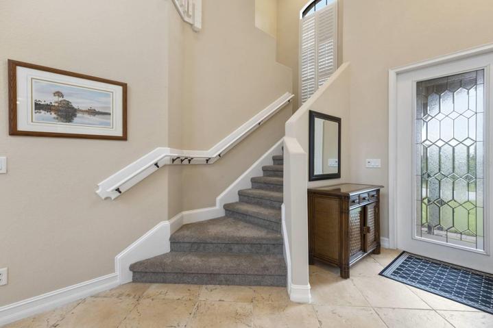 Beautiful staircase to upstairs living