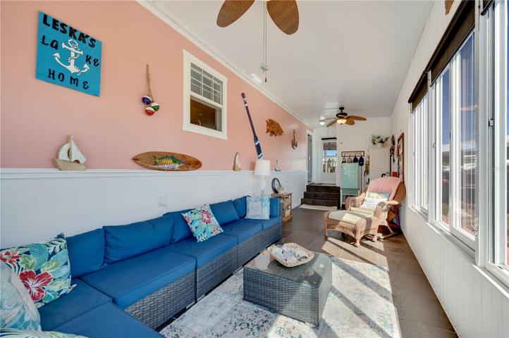 Sunroom under AC with a perfect view of the water.
