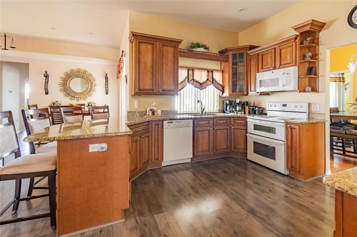 Beautiful and well cared for Kitchen. the window over the sink is a pass through window to the lanai!