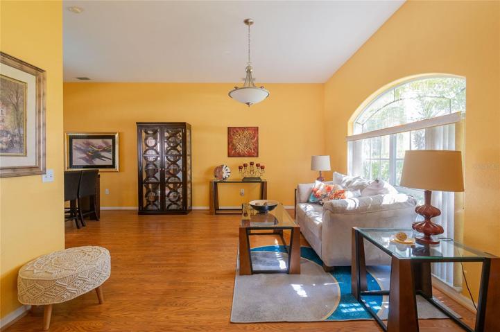 Living room/Dining room combo.  This is not the only living room area.  Make this area a fun dining area with sitting area to entertain many.