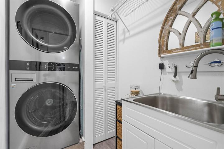 Laundry Room Equipped with Washer & Dryer