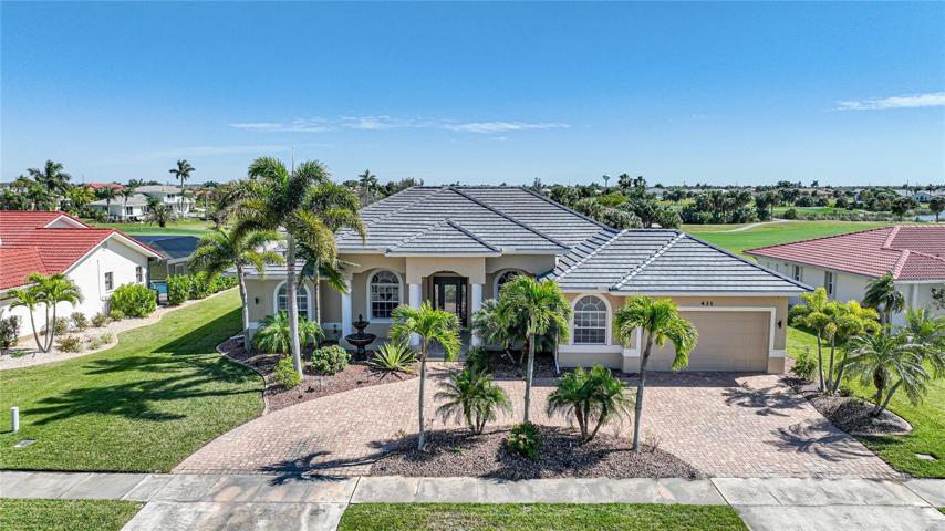 This beautiful former model home was built to impress with multiple upgrades throughout. The curb appeal of a large circular driveway, oversized garage and stunning front entry is just the beginning.