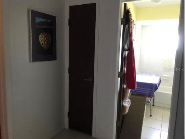 Guest Bathroom And Linen Closet In Hallway