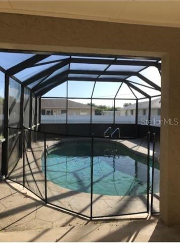 Beautiful Covered Lanai Leading To The Pool