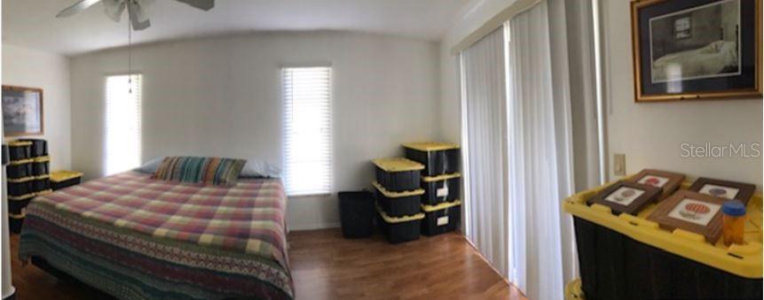Large Master Suite With Sliding Glass Doors To The Pool Area
