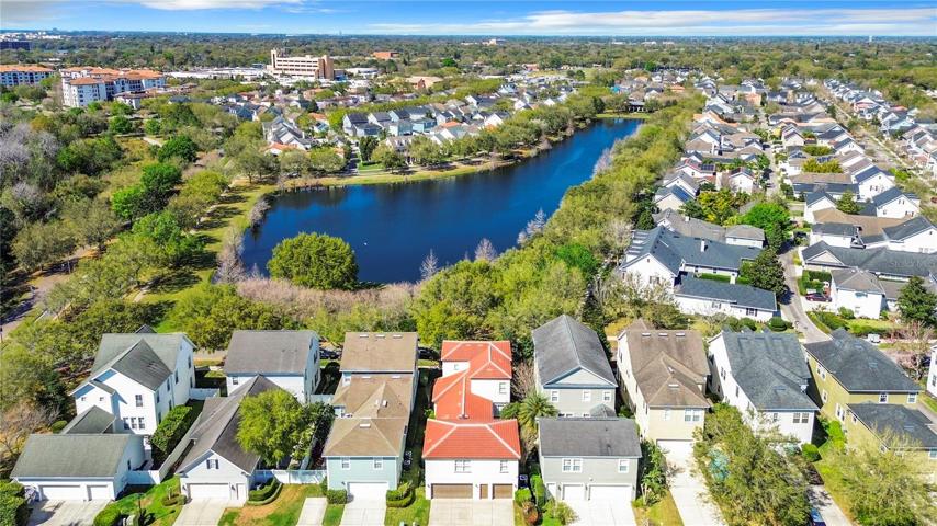 Drone View of Home and Pond in Front