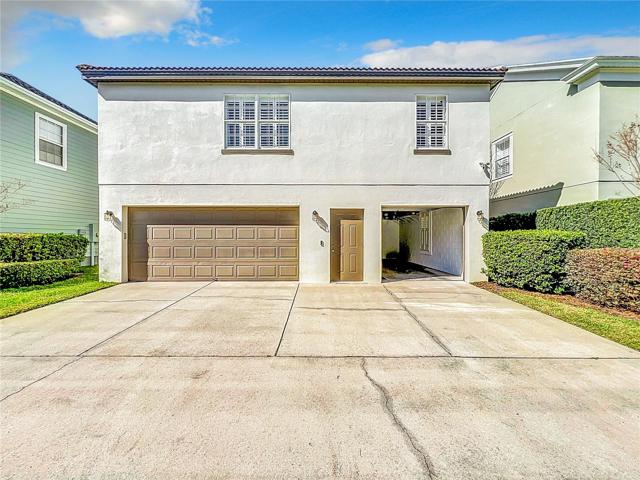 Rear of Home Showing Double Garage & Single Garage Doors