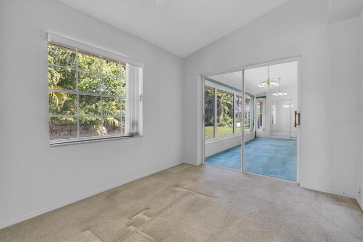 Owners suite retreat, sliders to enclosed lanai
