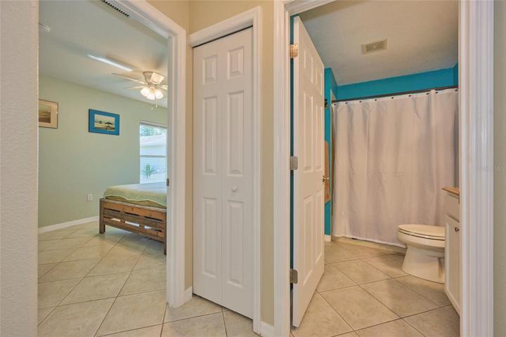 Guest bath that is located between the two guest bedrooms.  Linen closet