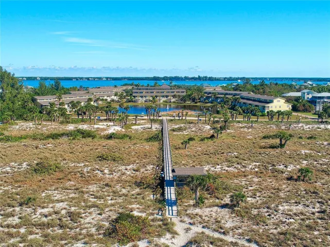 Hideaway boardwalk to the beach-Photo is not representative of the current condition of the community and buildings.