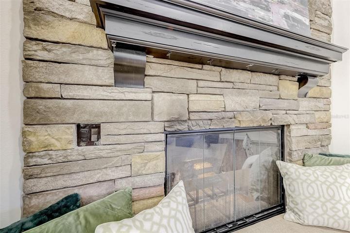 Fire place has hidden electrical outlets