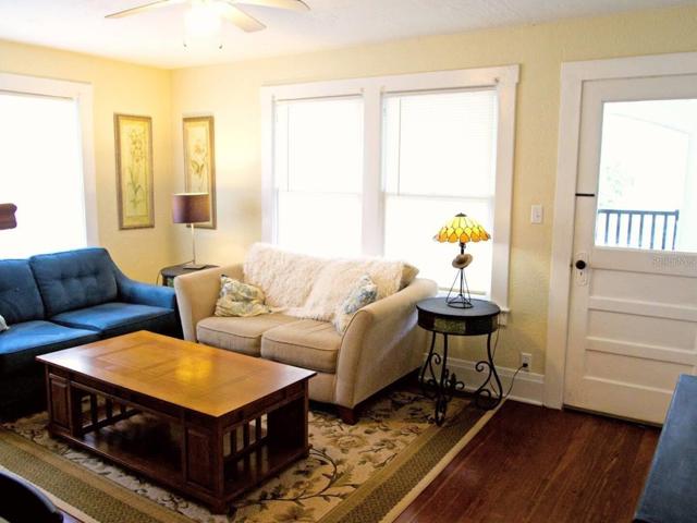 Apt 1 living room with door to porch