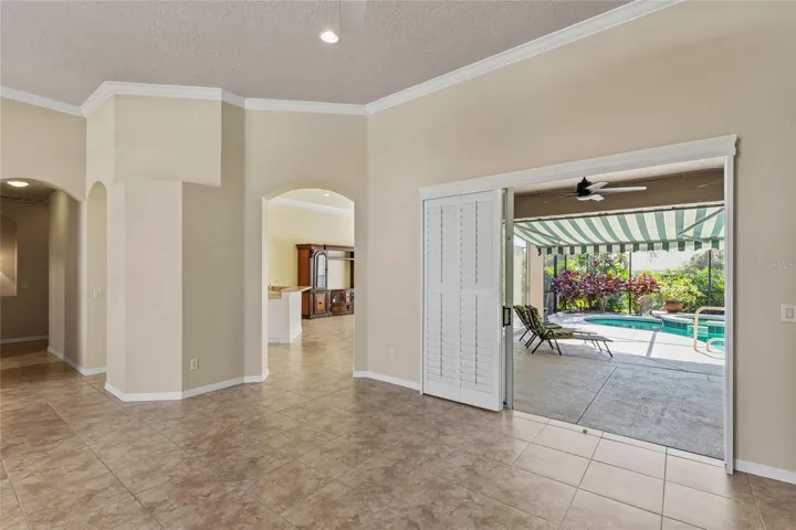 Living Room showing sliders open to Lanai